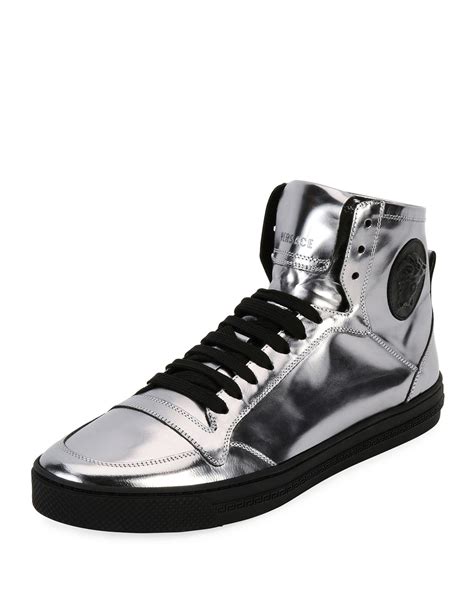 metallic silver sneakers.